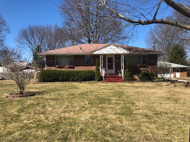 This quaint brick ranch sits in Cuyahoga Falls beckons a buyer. With three bedrooms, two full bathrooms, this gem is hidden in a resential area a short commute from restaurants, shopping, Chapel Hill and Route 8. Gorgeous hardwood in the kitchen gives way to slide out shelving cabinets that provide that little extra space for snacks. A fully fenced in backyard with a 52", above ground, HEATED pool, along with the patio makes summer days seem too short! The kitchen is fully appliance and features updated tile back splash and nice cabinets. The basement is partially finished with a recreation room and another room that could be another bedroom?? There is a full bathroom in the basement as well. Many home in the Falls have their 1 car garage, but this home is giving you a large 2.5 car garage! Some recent updates include a furnace that was replaced in 2016 and a hot water heater that was replaced in 2015. On top of that, new carpet was recently installed in 2017. Very neat, clean and well kept. Come spend some time in this lovely home and come to the realization you just found your new forever home. Pool table in the basement and basketball hoop are negotiable, AGENTS: please note showing instructions