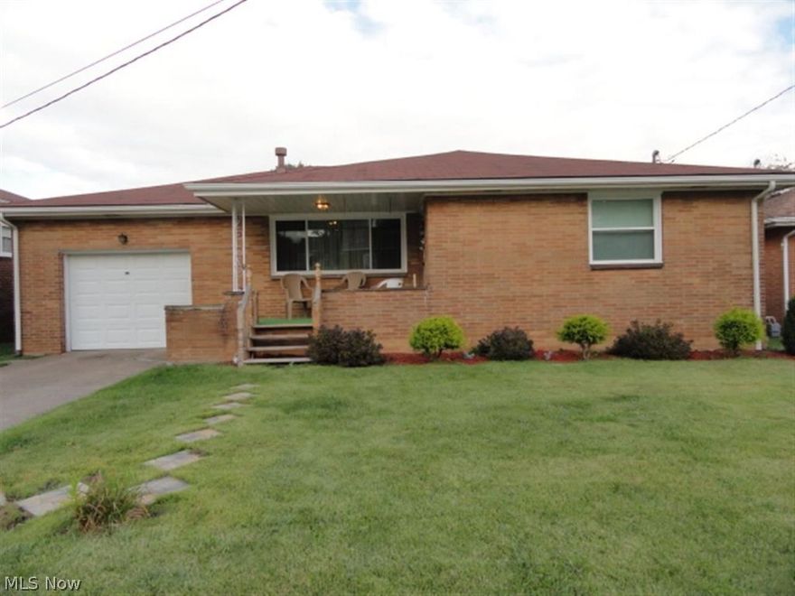 Spacious brick ranch on level lot with 1 car attached garage. 3 bedroom, 1 & 3/4 baths, hardwood in bedroom per sellers. Spacious eat in kitchen with breakfast bar, living room with fireplace.  Large full basement.