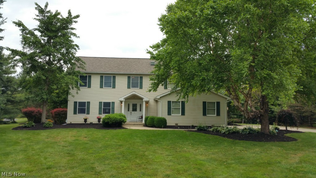 Custom Built in 1992 The Pendleton Colonial in the heart of Milan. The list of upgrades over the past 5 years is staggering.This extensive list of over $50,000 in upgrades to include a whole house generator. Plus, enjoy over 3 acres very well wooded for maximum privacy and enjoyment. The in ground pool off of the back of the home with a beautifully restored deck allows you to cool off in the summer. The bedrooms are on the 2nd floor along with the convenience of 2nd floor laundry. The master suite is very large, with his and hers closets, attached full master bath that includes a jacuzzi tub & Shower. 3 bedrooms enjoy a nice bay window to such a beautiful view of the back wooded acreage. The family room has a new gas fireplace and added extra space for entertaining. The basement has been finished to include a recreational area with a pool table and a family room. This is spacious colonial has a ton of storage, a very big fully stainless steel applianced kitchen, inground pool, outbui
