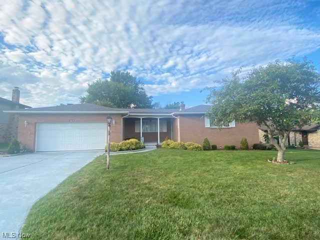 Brick Ranh home in very Desirable neighborhood. Brand New shingle roof. Great floorplan. Come in from garage to kitchen. Family room, kitchen with eat at bar and dining room with sliding door to sunroom. Kitchen has all appliances. Family room has gas logs in fireplace and another sliding door to cement patio. Large Livingroom. Full bath has newer bath fitter tub with shower and surround. Master bath has newer, walk-in bath fitters shower and glass door. Huge, finished basement. Small work room and storage room that is not finished but most of the basement has ceiling and carpet. Door in basement to walk out to back yard. Electric hot water tank has been purchased.