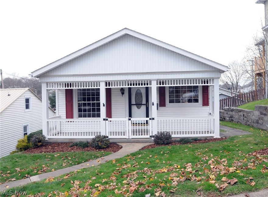 Beautiful home that has been completely remodeled with spacious living area.  3 bedroom 2 bath home with efficiency apartment in fully finished basement, perfect for In-Law suite or Roommate.  Attached one car garage, fenced in back yard with storage shed.  All appliances stay.  Furniture is negotiable.  Absolute must see !!