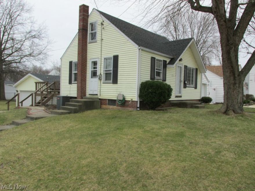 What a great corner lot with fenced yard and large garage.  Splendid deck off of back door gives home ample room for entertaining.  Beautiful woodwork throughout.  Fabulous updated kitchen with newer appliances and granite countertops.  Come take a look... don't miss this one!! Reduced to sell. Short Sale.