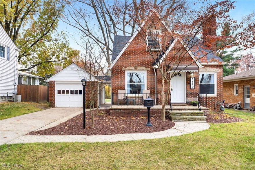 Welcome to 5840 Queens Hwy, a fully updated and charming Parma Heights home offering classic appeal, modern comfort, and ideally located within walking distance to the MetroParks. This residence features ample curb appeal with its timeless brick exterior and a detached one-car garage. Step inside to a warm and welcoming family room highlighted by bright neutral walls and a beautiful fireplace, creating the perfect place to relax. The flow continues directly into the thoughtfully updated kitchen, showcasing stainless steel appliances, granite countertops, and bright white solid wood cabinetry, along with a cozy eat-in dining area. The first floor bedrooms are cozy and quiet, and share a bathroom that has been tastefully updated with all new fixtures and porcelain tile. The second floor offers an expansive bedroom with an additional space for home office, nursery, or entertainment area. The partially finished basement adds even more versatility with carpeting, extra living space, a second full bathroom, and a separate laundry/utility room. Step outside to enjoy a concrete back patio overlooking a fenced backyard, perfect for outdoor dining, relaxing, or pets. With its blend of classic charm and modern updates, 5840 Queens Hwy is ready to welcome you home.