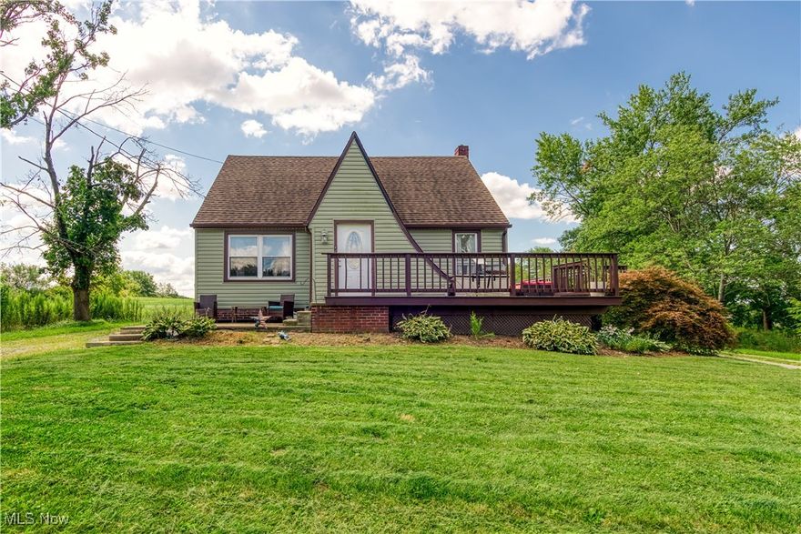 Lovely Bungalow style home situated in a private setting in Louisville! Welcome to 6032 Crock Street. Spacious kitchen offers all stainless steel appliances, white cabinetry and a nice bar area for extra seating. Kitchen opens into the nice sized dining room and living room overlooking the front of the home. If first floor living is ideal then this is for you! First floor master bedroom, full bath plus a first floor laundry and mudroom. Second floor offers two additional bedrooms and a half bath. Outside you will find a newly stained, wrap around deck, overlooking the lovely yard which is situated on 1 acre. Garage fanatics!! Detached garage space is amazing here! An additional 24x36 heated garage features a 10,000 pound two post lift which was built in 2017. New septic installed in 2009, approximate updates include furnace and a/c in 2018, breaker panel in 2009 and windows in 2011. See today!