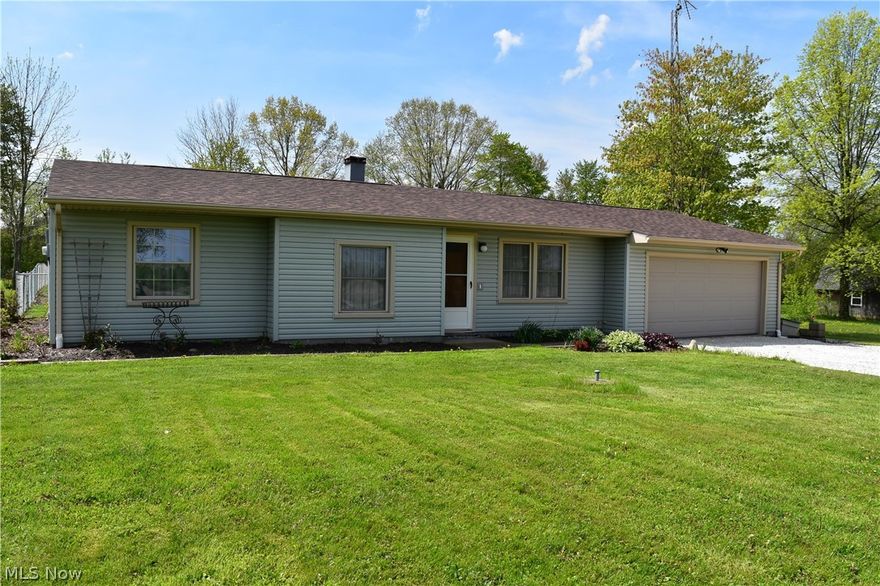 Enjoy one floor living in this well-maintained Ranch set on 1+acre! This home offers 3 Bedrooms, 1.5 updated baths, Living Room, Kitchen with appliances and Dining Room open to Great Room addition with wood laminate floors & access to covered back porch. Master Bedroom includes updated private half bath. Full  bath remodeled with bath fitter & new granite vanity in 2016. Freshly painted interior, solid wood interior doors & generous closet space throughout. New roof has just been installed March 2019. New well 2013. Newer vinyl siding & furnace. Full fenced-in backyard with wooded views. 2-car attached garage plus shed for additional storage. Grand Valley Schools.