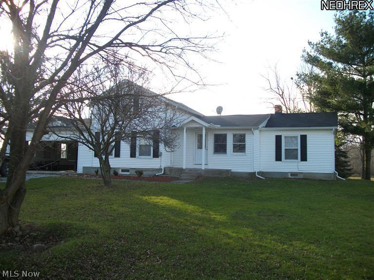 You wont believe the room to roam at this great piece of property!!! Home sits on 6 acres of land and has a sprawling 2232 Sq ft with attached 2 car garage.The home is perfectly laid out for a nice size mother-in-law suite if needed or the master suite on separate ends of the house. The list of improvements goes on and on. New septic system that is regularly inspected and cleaned,new roof, complete basement waterproofing,new kitchen with vaulted ceilings,freshly painted, etc! Everything has been done...just move right in! Don't wait long to call this beautiful house your home!!!!