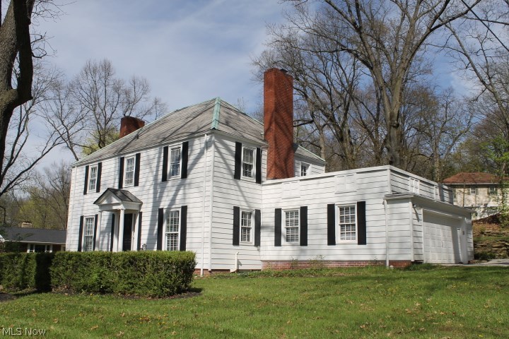 Feel the history. Circa 1931. 3 story home is located on 3 city lots on East side of the Historical downtown district of Mount Vernon. 3300+ fin. s.f. plus finishable lower level. 5 bedrooms, 3.5 baths, 3 fireplaces & more! Immaculate & ideal for entertaining w/many unique futures: 2 flat roof porches off BR’s on 2nd floor, unique fire pit & large concrete patio. Original character & charm, with ornate trim fireplaces, double crown moldings, refinished hdwd floors, retro kitchen cabinets & knotty pine den/library. NEW: electrical, high eff gas furnace, central air, water heater, flat roofs, concrete sidewalks & driveway and major excavation work for a bone dry basement. The kitchen has new granite counters & stainless steel appliances. This house has a ton of WOW built into it.