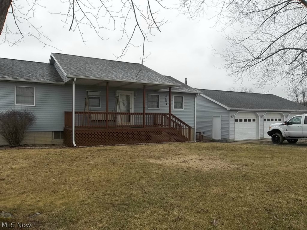 Spacious Ranch home! This home has much to offer with 5 beds and 2 full baths! Large living room for entertaining, kitchen with oak cabinetry and breakfast bar, dining room opening onto large 2 tier deck overlooking the countryside! Oversized Recreation room in basement has room for the whole family including a built in bar, nice laundry room. 3 car detached garage! See what this home has to offer your family!