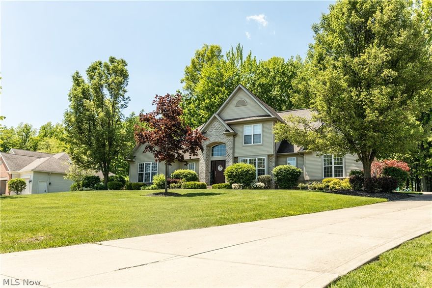 Welcome to this beautiful, spacious, and recently updated home conveniently located in the Hunt Club. The owner suite is located on the first floor, with a private full bathroom and a roomy walk-in closet. The large windows throughout the home provide natural light, giving the home a warm, comfortable atmosphere. The kitchen and bathrooms have been updated with granite countertops. The finished basement adds the possibility of a fifth bedroom along with two additional rooms for a home gym, wine cellar, or whatever hobby space your heart desires! The oversized two-car garage is heated with water access. Finish out your day by relaxing in the hot tub while enjoying the peaceful backyard  Easy to show, schedule with your agent today!