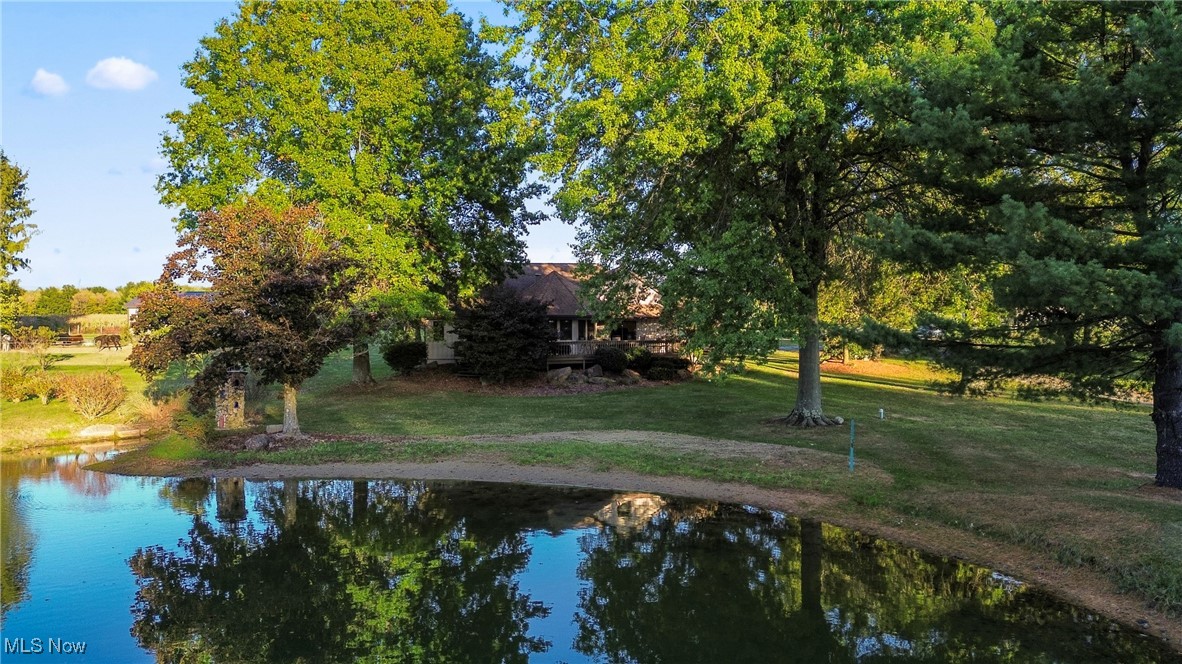 Welcome to this beautiful 4-5 bedroom, 3.5-bath home set on almost two picturesque acres overlooking a spring-fed pond and rolling farmland. This property offers the perfect balance of comfort, space, and rural tranquility ideal for those seeking a private escape with stunning views in every direction.
Step inside to find a bright, open layout designed for both relaxation and entertaining. The spacious living area flows into a well-appointed kitchen featuring ample cabinetry, modern appliances, and dining area; a huge adjacent pantry (which had been 5th BR), living room w/ slider to the deck.  
The primary suite provides a peaceful retreat with its own ensuite bath and generous walk-in closet. The sunroom connects the family room to the primary suite overlooking the stunning pond, perfect for a music room or home office. The second bedroom and a half bath complete the first floor. Two additional bedrooms, a loft, and a full bath make up the second story.
The finished basement has another full bathroom, laundry, tons of storage, and another incredible living space to use as game room or playroom- whichever suits your family's needs--and a library. Outside, enjoy morning coffee on the brick patio or evening sunsets from the wrap around deck while overlooking your semi-private pond and the serene farmland beyond.
40' x 32' pole barn--with electric and water--and adjoining fenced pastures provide space for horses, cows, chickens, and more.  There's a water hydrant at the pasture too.  Peach and apple trees, blueberry bushes and strawberry plants provide an abundance of sweet treats.  The private mini-farm provides endless opportunities for gardening, recreation, or simply soaking in the quiet countryside. 
With its beautiful setting and welcoming interior, this home delivers country living at its finest—just minutes from schools, shopping and dining in Cortland and Route 11 for easy commuting.