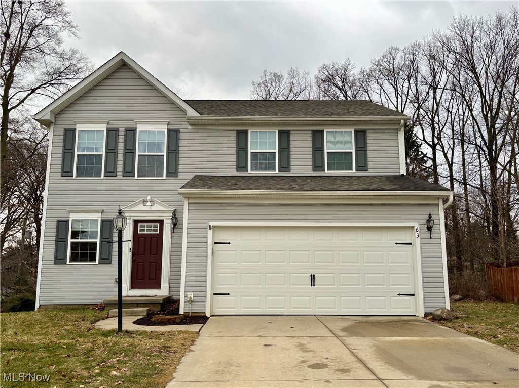 Welcome home to this beautiful 2016-built 3 bedroom colonial nestled on a peaceful cul-de-sac. Step inside to a bright and inviting main level, where the spacious sunroom offers versatility as a dining area, sitting room, or home office. The cozy living room boasts a fireplace, creating the perfect gathering space. A convenient half bath and mudroom entry from the garage add practicality to everyday living. Upstairs, you’ll find a spacious primary bedroom with a private ensuite and a sizable walk-in closet, along with two additional bedrooms and a second full bath. The laundry room is also on the second floor, making chores a breeze. The unfinished basement offers endless potential—customize it to fit your needs, whether it be a recreation room, home gym, or extra living space. Outside, this home features a custom-built deck overlooking a serene, wooded rear property line and side view of the nearby pond—perfect for outdoor entertaining or quiet relaxation. Don’t miss this fantastic opportunity to own a move-in-ready home in the Tallmadge School District! Schedule your showing today.