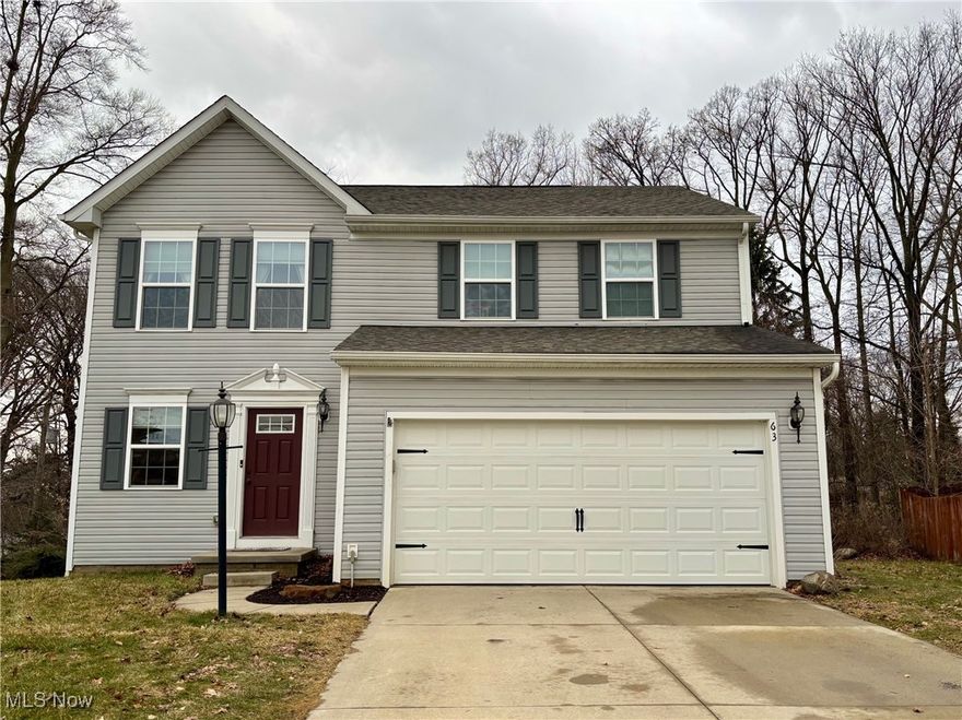 Welcome home to this beautiful 2016-built 3 bedroom colonial nestled on a peaceful cul-de-sac. Step inside to a bright and inviting main level, where the spacious sunroom offers versatility as a dining area, sitting room, or home office. The cozy living room boasts a fireplace, creating the perfect gathering space. A convenient half bath and mudroom entry from the garage add practicality to everyday living. Upstairs, you’ll find a spacious primary bedroom with a private ensuite and a sizable walk-in closet, along with two additional bedrooms and a second full bath. The laundry room is also on the second floor, making chores a breeze. The unfinished basement offers endless potential—customize it to fit your needs, whether it be a recreation room, home gym, or extra living space. Outside, this home features a custom-built deck overlooking a serene, wooded rear property line and side view of the nearby pond—perfect for outdoor entertaining or quiet relaxation. Don’t miss this fantastic opportunity to own a move-in-ready home in the Tallmadge School District! Schedule your showing today.