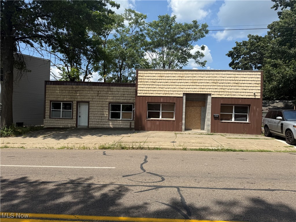 Unlock a unique commercial opportunity in North Hill, Akron. This 1,838 sq ft, single-story Class C office/retail building, set on a 0.09 - acre corner lot, stands ready for your vision. Built in 1950, the property features two dedicated off- street parking spots and flexible interior space suitable for office, retail, or service use.
Known in public records as "Store building," the property's zoning is designated as X - offering potential versatility. Located just steps from major arterial routes, with high local visibility and easy access, this asset represents a cost-effective, turnkey entry for investors or small-business owners looking to plant roots in a revitalizing community.