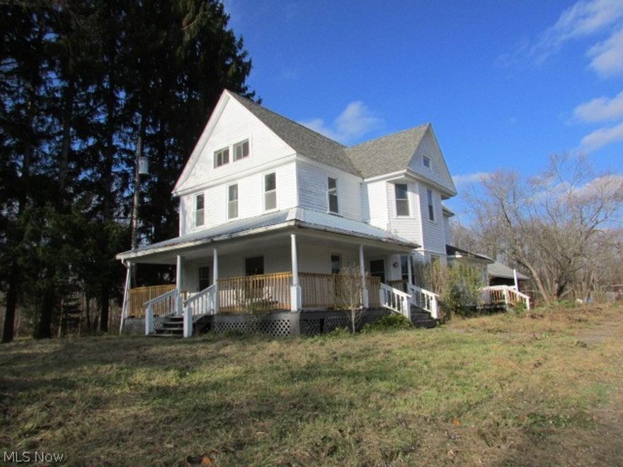 Renovation is well on its way in this beautiful, older home.  Large house with plenty of charactor and an opportunity to finish it out.  Large rooms and high ceiling help add to the appeal of the property.  In addition to the main house, the detached garage has an apartment or office in it.  Don't let this one slip away.