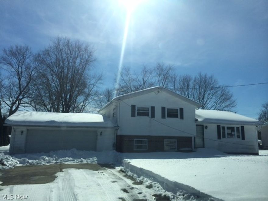 Property being Sold AS IS via an online marketing event. This split level needs some Love! Lower level was finished and could easily and could easily finish it again.  Studs are still up needs flooring and walls.  The Main Living area of the home has laminate flooring and updated windows.  The upper level features the bedrooms and full bath.  The lower level has a full bath that needs completed.  A lot of potential in this home and located on a quiet street close to Copley.  Call today to see this property. Online auction March 21-25