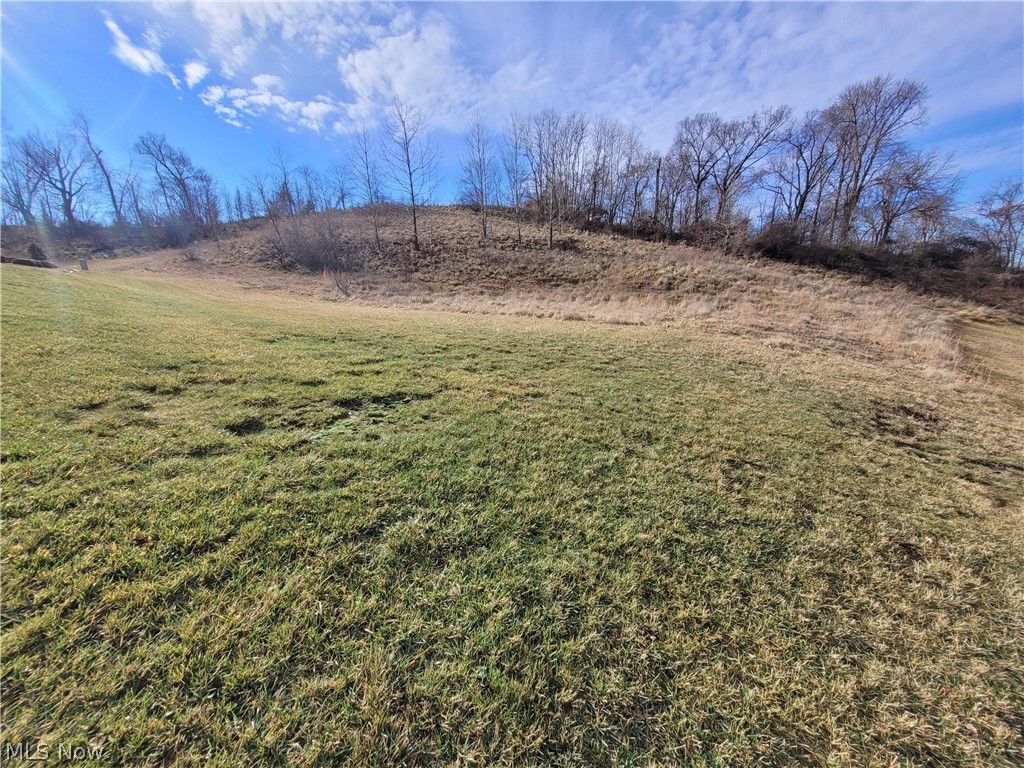 Lot that has a wonderful view. Located in the planned community of Wyndemere Enjoy easy access to Vienna and from Parkersburg. Utilities at street.