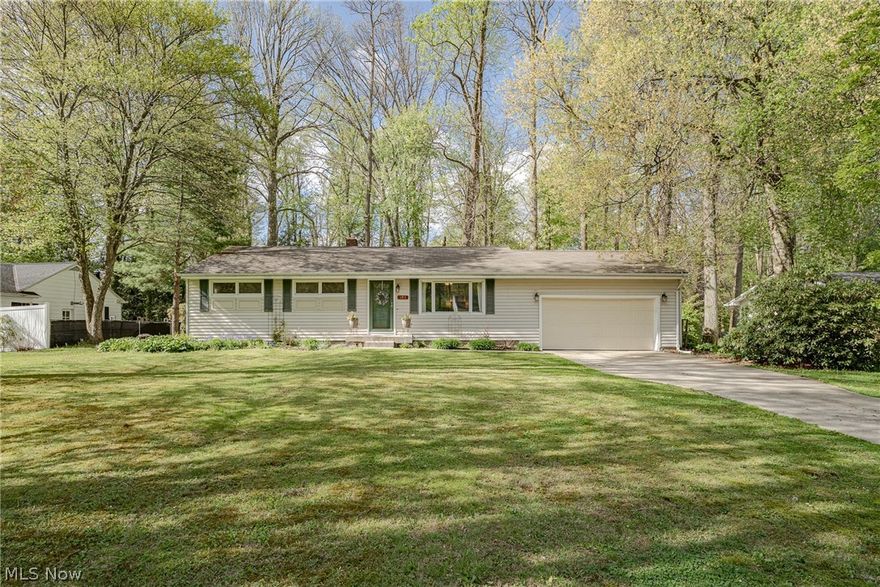 Welcome to 193 Timberlane Dr – A Peaceful Ranch Retreat in Northfield!

This spacious ranch-style home sits on a large, tranquil lot, offering the perfect blend of comfort, functionality, and a serene setting ideal for everyday family living. From the moment you step through the front door, you’re welcomed into a bright, sun-filled living room featuring beautiful hardwood flooring and a large picture window that fills the space with natural light.

The layout flows seamlessly into a formal dining room, also with hardwood floors, creating a warm and inviting space for family dinners and gatherings. The kitchen is both functional and charming, offering a full complement of appliances, rich hardwood cabinetry, and a timeless brick backsplash.

Toward the back of the home, you’ll find a spacious family room designed for relaxing and entertaining, complete with a vaulted ceiling, a cozy brick fireplace, and two oversized picture windows that bring in peaceful views of the outdoors. Sliding doors lead directly to an enclosed porch—perfect for enjoying morning coffee or unwinding in the evenings.

Down the hallway, the home features three comfortable bedrooms and a full bathroom, offering a practical and family-friendly layout. A convenient half bath is located just off the family room for guests.

The full basement provides abundant storage space, a dedicated laundry area, and endless potential for future finishing if desired.

Step outside to enjoy the tranquil back deck, where you can take in the expansive yard and the natural wooded backdrop—an ideal setting for outdoor gatherings, play, or simply relaxing in your own private retreat.

This home offers space, warmth, and a peaceful setting all in one—don’t miss out on this one and schedule your showing today!