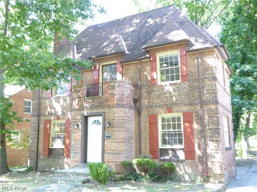 Elegant Cleveland Heights brick Colonial around the corner from Denison Park.  Check out the large room sizes!  All freshly painted and brand new carpeting.  Four bedrooms, two full baths and a half bath off the 3rd floor bedroom, sun room off 3rd bedroom and basement rec room.  Stackable laundry in kitchen and hook ups in the basement. Updated boiler and electrical. Beautiful shaded lot on quiet brick street with two car garage, both bays with garage door openers. This is really a must see because the house feels very spacious when you are walking through it.