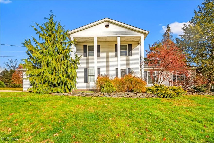 Welcome to Paradise, where modern updates meet timeless Colonial charm. This spacious 4-bedroom, 3-full-bath home offers just over 2,200 sq ft of beautifully remodeled living space. An updated kitchen, fresh flooring, plush new carpet, and warm recessed lighting that creates great light throughout the Home. Every major improvement has already been taken care of for you—brand-new furnace, hot water tank, electrical panel, and windows, all installed in 2025, Each bedroom features a ceiling fan, and the thoughtful updates. Overlook a scenic view of the Metro Parks, also near the Painesville Country Club and Riverside High School. A large back deck is perfect for outdoor gatherings, on a huge almost 1 acre corner lot. Move-in ready and meticulously maintained, Paradise is the perfect blend of style, comfort, and modern convenience.