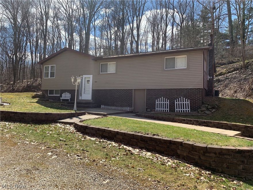 Move-in READY!!! Enjoy the lake life in this 3 bdrm., 1.5 bath home whiting a walking distance from the dock! Whether you are looking for a year-round home or a weekend retreat, this property deserves your attention. The house sells completely furnished and with a pontoon boat & trailer.  As you walk in you'll be welcomed by the living room with fireplace and a kitchen with lots of storage! Also, on the first floor you'll also find three bedrooms and a 1.5 bath. In the lower level, you'll find the spacious family room with fireplace and more room for storage. The flat yard is the ideal place to entertain family and/or friends.  Low traffic, peaceful location. Schedule your private showing today to view this home.