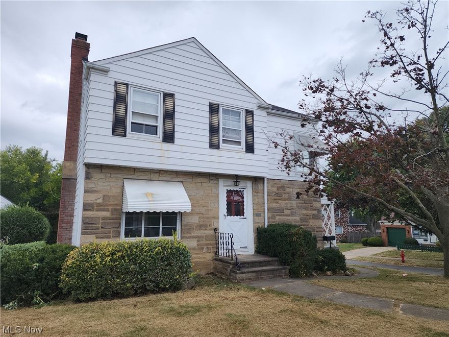 Garfield Heights Colonial 3 bedroom 1 bath, this home has a great layout with large living space added porch on the back of the house for enjoying the seasons.  Full basement off street parking 2 garage .  Great location to Schools, shopping and I 480.