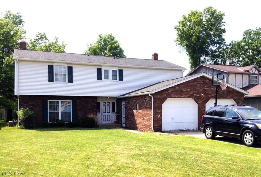 Updated Luxury 2 bedroom duplex! Updated kitchen with newer counter tops, appliances, light fixtures and fresh paint. Extra large half bath on first floor. Huge living room with wood burning fireplace. Giant sized master bedroom with walk-in closet, large second bedroom with walk-in closet plus additional standard closet. Updated full bath, newer light fixtures, updated paint. Laundry hook-ups. Beautiful patio separated with a brick wall between units to afford resident great privacy. Over sized garage with electronic door opener! This is a great location and a great property. Rent includes Water/Sewer and Trash