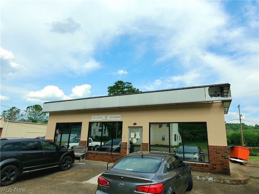 Commercial building good for retail or office use in a high traffic area. Seating area, large room, separate office rooms and bathroom. Parking around building. Previously used as a busy hair salon. Schedule your showing today! TB