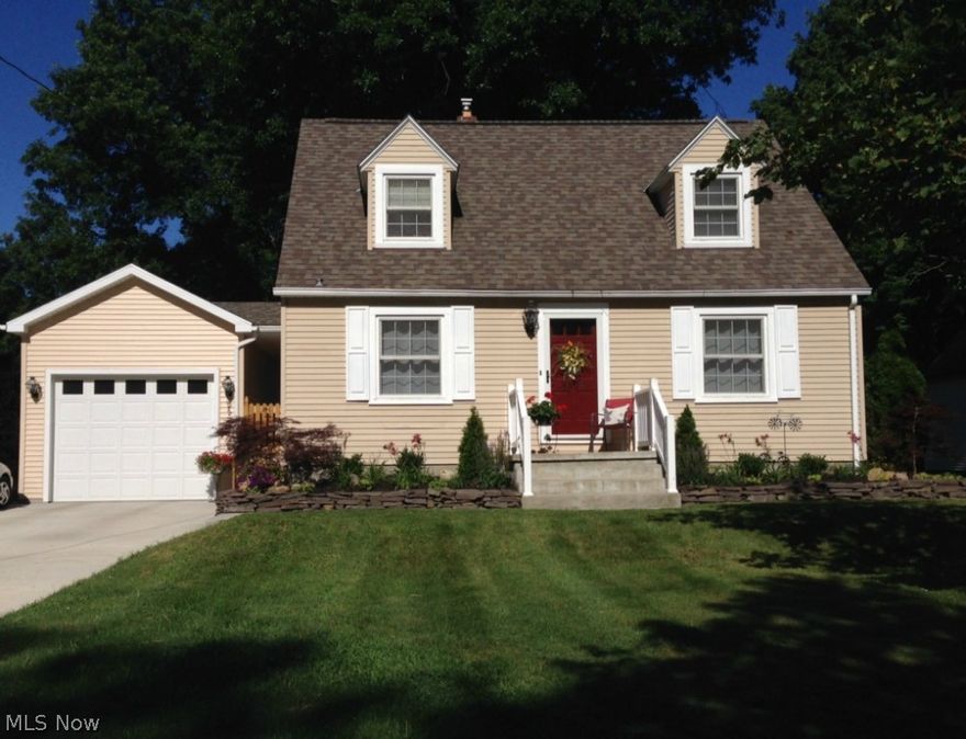 Beautifully well-maintained Cape Cod on private, park-like lot! Gorgeous newer stainless steel applianced kitchen featuring maple cabinetry, ceramic tile floor, neutral stone and glass backsplash with over and under cabinet lighting. Spacious and bright open living and dining room with hardwood flooring. Updated main bath on first floor along with a first floor bedroom.  Upstairs you will retreat into your Master Suite with dormer and walk-in closet, there is also an updated half bath and additional 8x16 room which could be a play area, office/study or a sitting area as well. Newly finished recreation room in the lower level offers extra living space! All the updates have been done! List of 2014 Updates include: Patio, fence, storm doors, porch railing, landscaping, laminate flooring in basement, Levalor Shades in all windows, Carpet in Lower Bedroom, freshly painted bedrooms, and smoke detectors.  In the lower level you will find your laundry area and a full shower.  The extra large y