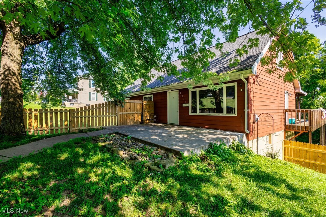 Welcome to 4031 Argonne Ave! This charming 5-bedroom, 2-bath home is ideally located just 8 minutes from Franciscan University and close to Trinity Hospital, local amenities, and Route 22 for convenient travel. As you enter, you’ll find a spacious living room to the left that flows seamlessly into the kitchen—where all appliances are included. Just off the kitchen, step out onto the deck, perfect for lounging in a hammock and enjoying the serene backyard. The main level features three bedrooms, one of which is currently being used as a laundry room but can easily be converted back into a bedroom. A brand-new full bathroom was added on the main floor in 2024, offering modern comfort and convenience. Upstairs, you’ll find two additional bedrooms and another full bathroom. The partially finished basement is currently used as a rec-room, providing additional living or entertaining space. Outside, a brand-new fence was installed around the front yard in 2024, adding both curb appeal and privacy.