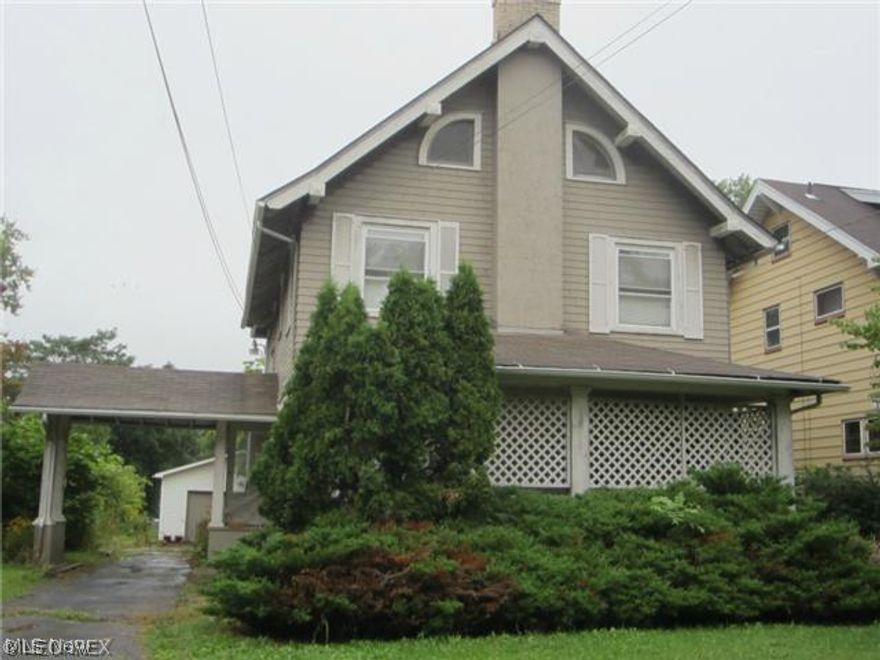 Owner wants this home SOLD.  Large 3 Story Duplex.  Newer roof & some newer windows.  Beautiful woodwork throughout.    Separate gas and electric, (2 furnaces (one newer), 2 newer breaker boxes), 2 a/c units.  Newer 2 car garage.  First floor....living room with fireplace, kitchen, dining room, 1 bedroom, bath and full basement.  Upstairs is 2 bedrooms, living room, kitchen, bathroom and walk up attic with 2 additional rooms.  Each unit $450 month.  Make an offer today!