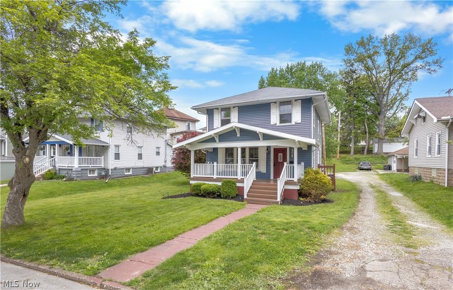 Turn-key and full of character, this inviting 2-story home offers the space and features buyers are looking for! With 3 bedrooms and 1.5 baths, you’ll love the spacious living room showcasing a striking stone fireplace, built-in cabinetry, and beautiful natural woodwork throughout.

The bright eat-in kitchen features stainless appliances, ample cabinet space, and direct access to the expansive wraparound porch that extends from the side of the home across the back—perfect for relaxing or entertaining. Main-level laundry and a half bath add everyday convenience.

Upstairs offers three comfortable bedrooms and a full bath, while the full unfinished basement provides excellent storage potential. Enjoy outdoor living with a covered front porch, large wraparound side/rear porch, and a generous side yard.

Situated on a quiet residential street with public utilities, central air, and gas heat. Appliances including range, refrigerator, dishwasher, over-the-range microwave, washer, and dryer will convey.

Homes with this much character, usable space, and outdoor living don’t last—schedule your showing today!
