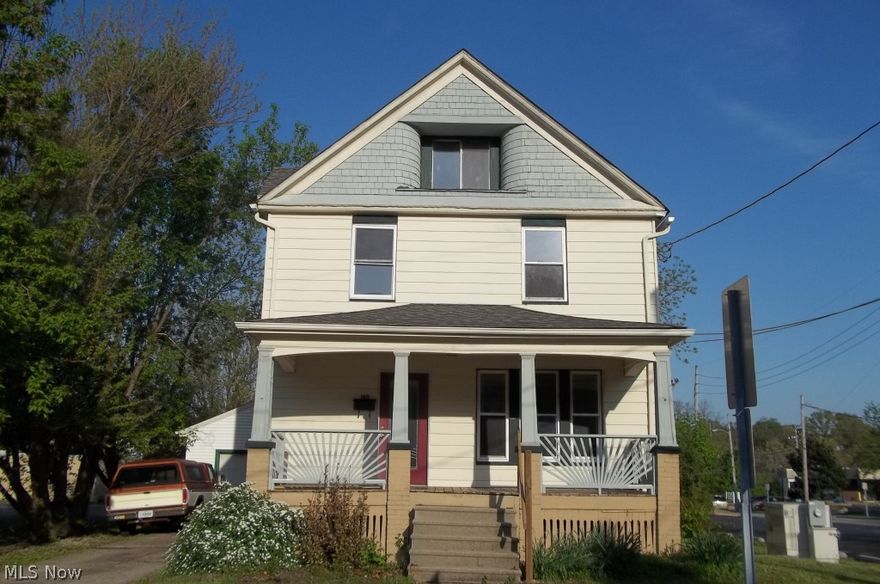 This colonial is walking distance to downtown, shopping, exercise facilities restaurants and much more.  The home has been renovated but still has the natural wood work in living room. The kitchen has been remodeled with lots of storage and center island.  The ½ bathroom off the kitchen and the full second floor bathroom have both been remodeled..Newer carpet throughout home.  The third floor has a bonus room with newer carpet.  The home also has a front porch to relax on and fenced in back yard. One car garage.Partially finished basement with newly added full bathroom.