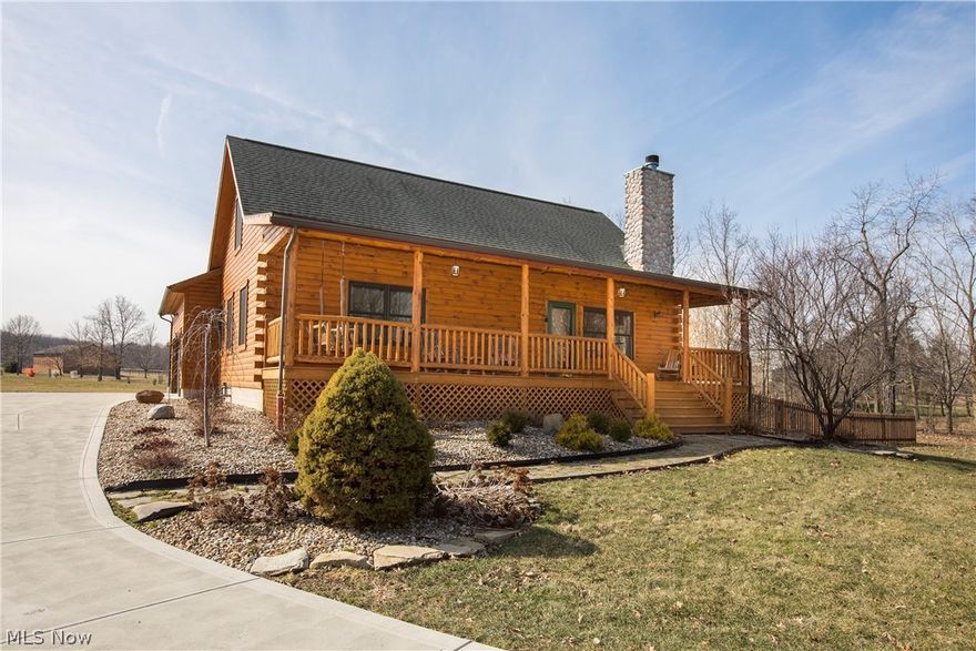 This is an amazing custom built log home with an awesome Out Building (Car/Wood Shop).  The home is absolutely stunning featuring 3 bedrooms 2 full baths.  There is a stone fireplace in the great room with a beautiful loft area overlooking the great room and a full unfinished basement that has been plumbed for a third bathroom.  There is a 2 car rear entry garage and a very inviting front porch.  There have been numerous upgrades made to this home as well.  The Out Building is unbelievable offering 2400 square feet (1500 on ground level and 900 sqft. on the upper level) with a full bath with two additional rooms that would make beautiful bedrooms.The first floor offers 11' ceiling height and the upper level offers 8'.  There is so much more to share, please check the highlight sheet on line.  If this is what you are looking for, please don't waste any time.  This is truly one of a kind...