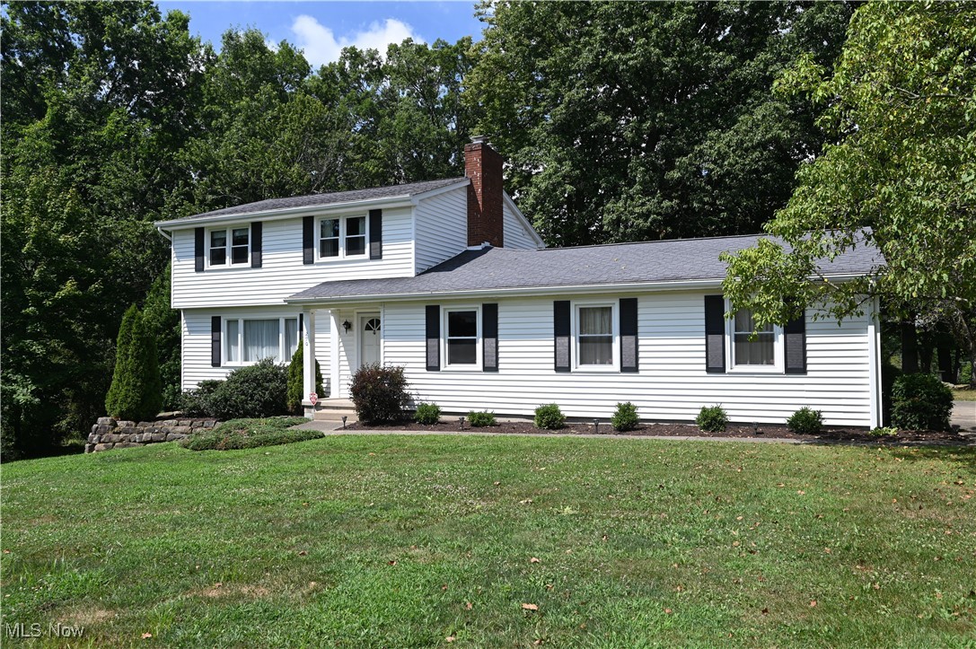 Charming, 3 bed, 3 bath colonial on a wonderful Canfield City Street, in the acclaimed Canfield School District. Pre-Inspected by an ASHI certified Home Inspector. Report available upon request. This home offers a nice blend of comfort and convenience, situated in an ideal location in the east end of town. Impeccably kept with its single owner since being built, this property radiates charm as you coast thru the traditional colonial design. Entry into a spacious living room, through to a formal dining room, family room half bath and kitchen. Down two steps in the rear of the house to a bright and cheery, 3-season room for anytime of the day and night on those warm days and nights with multiple sliders, so on nice days, all doors can be opened. Upstairs offers 3 bedrooms, ensuite & third bath. Please note that the basement has a walk-out, coupled with full, glass block windows, bringing in abundant amount of daylight. Inviting opportunity for finishing!! Patio access from basement. Nice shower in basement as well. Wonderful, mature trees surround this lovely home. Two-car garage. Newer roof, HVAC and HW Tank. Just minutes away from the bustling shopping and restaurant district, as well as Mill Creek Metroparks access alike. Immediate possession. Call today for your private showing.
