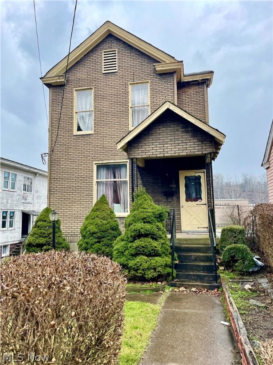 Not A Drive-By! This affordable 4 BR, 2 BA home in the Fulton area of Wheeling is very nice & spacious inside. It features a large eat-in kitchen with all appliances, a first-floor bedroom and half bath, as well as three more bedrooms and a full bath upstairs. The basement is in good shape with a workroom section, a separate laundry area, and an extra shower. You can walk out the basement door to the parking area--bit enough for 4+ cars. This is a lot of house for the money.