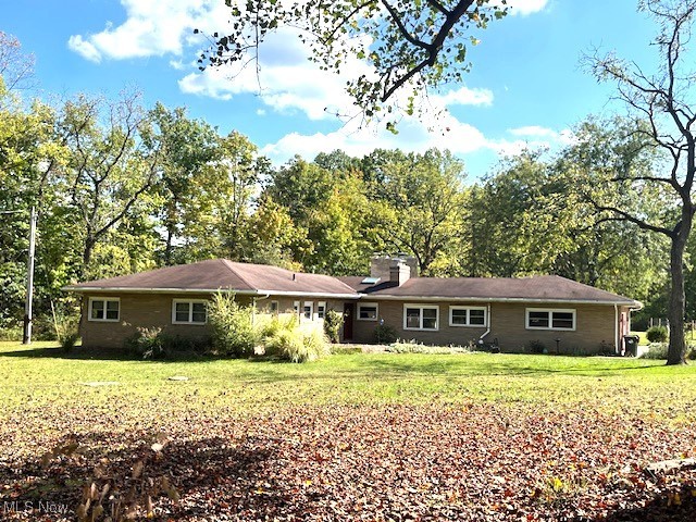 Sprawling well-maintained brick & cedar Ranch on 3.17 picturesque acres. Tranquil 1-acre pond with fountain and dock. Large Great Room w/fireplace. Sliding door to patio w/flowering gardens. Beautiful kitchen w/cherry cabinetry, newer backsplash, lighting, double sink and island w/Corian counters. Walk-in pantry w/additional cabinets. Additional row of cabinetry with some glass doors and eat-in area. Amazing 4-season sun room w/wall of windows, tile floor and wet bar to enjoy beautiful views. Dining room features wood floors and fireplace. Huge master suite consists of 4 areas with bedroom area, sitting room, closet/dressing area w/drawers and updated master bath. Six-stall horse barn w/some concrete floors, storage rooms & work room. 2-car attached garage.