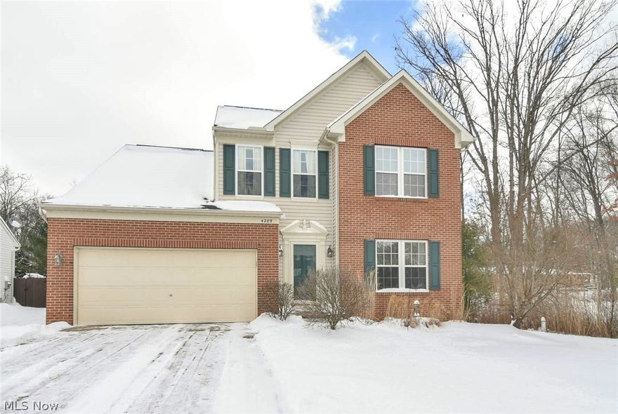 Impressive 4 bedroom, 2.5 bath home offers both quality and style.  First floor 9' ceilings give this contemporary an open and airy feeling.  A beautiful stone fireplace accents the family room which opens to the gorgeous kitchen with 42" high cabinets, new granite counters (2017), new stainless steel appliances (2017), new backsplash (2017),  breakfast bar and plenty of storage.  Filled with natural light, the morning room is bright and cheerful and adds an additional area for entertaining.  (Dimensions for the morning room are shown as "other room").  The first floor laundry room is a welcome convenience and a must have for a busy lifestyle.  A formal living room (currently used as an office) and half bath complete this level.  Upstairs you'll find 4 spacious bedrooms and 2 full baths with newer flooring.  The master bath offers a separate shower, soaking tub and double sink vanity.  An unfinished basement has rough in plumbing for a third full bath and plenty of room to design your