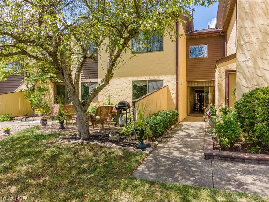 Welcome home to 869 Hampton Ridge Dr in Hampton Woods. This peaceful oasis includes scenic views of the fountain/pond along with tons nature life. The townhouse includes roughly 2000 square feet, three bedrooms and 2.5 baths. First floor has two large living spaces adjoined by the kitchen space. All neutral flooring and paint complimented with tasteful decor. Dining area includes full wall mirror. Family room includes tiled gas fireplace and wet-bar. Kitchen is open to both spaces. There is also half bath on the first level. Second story includes large master suite, with walk-in closet, full bath and  large vanity area. Two additional bedrooms share full bath and generous sized hall-wall closet. Second story laundry. Updates include renovated kitchen with granite counter-tops and stainless steel appliances. Newer party wall (2019). New Hot Water Tank (2019). Newer light fixtures throughout and paint.  HOA fee includes cable and internet. Brick patio overlooking fountain with wild life