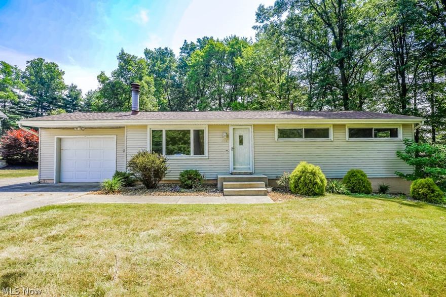 Enjoy the convenience of ranch living in this 3 bedroom home nestled on a sprawling full acre in Jackson! Deceptively spacious, this home boasts two inviting gathering spaces - a cozy front living room with a fireplace and a vaulted family room offering panoramic views of the property. The kitchen is thoughtfully designed with ample cabinet and counter space, complemented by a built-in display cabinet in the dining area. Down the hall, discover three comfortable bedrooms with generous double closets and a full bath featuring an oversized shower with an integrated bench. Outside you'll appreciate the extended driveway leading to the attached one car garage and a generous deck overlooking the park-like backyard. With recent upgrades including a newer roof and hot water tank, this centrally located gem is sure to impress. Don't miss the opportunity, call today to schedule your visit! Selling as-is.