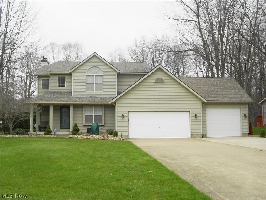 A definite beauty!  Welcome to this 3 bedroom, 2.5 bath contemporary home with hardwood flooring in the foyer and hallway.  The great room offer a gas fireplace and opens to the updated kitchen with granite counters and granite sink, tiled backsplash, stainless steel refrigerator and stove, newer fixtures and flooring, plus a nice size pantry.  Sliders from the kitchen lead to the 3 season sun room (12 X 14) with 2 sets of sliders for easy access to the deck.  The backyard is truly amazing, in addition to the deck it features a gas fire pit, gazebo and shed making it a great entertainment area.  A formal dining room and laundry room with closets and cabinets complete the first floor.  Upstairs you'll find a master suite with a 7 X 7 walk-in closet with custom built organizers and a full bath offering a double sink vanity, walk-in shower and soaking tub.  The home comes with drywall if you choose to finish the basement for additional living space.  The heated 3 car garage features pull