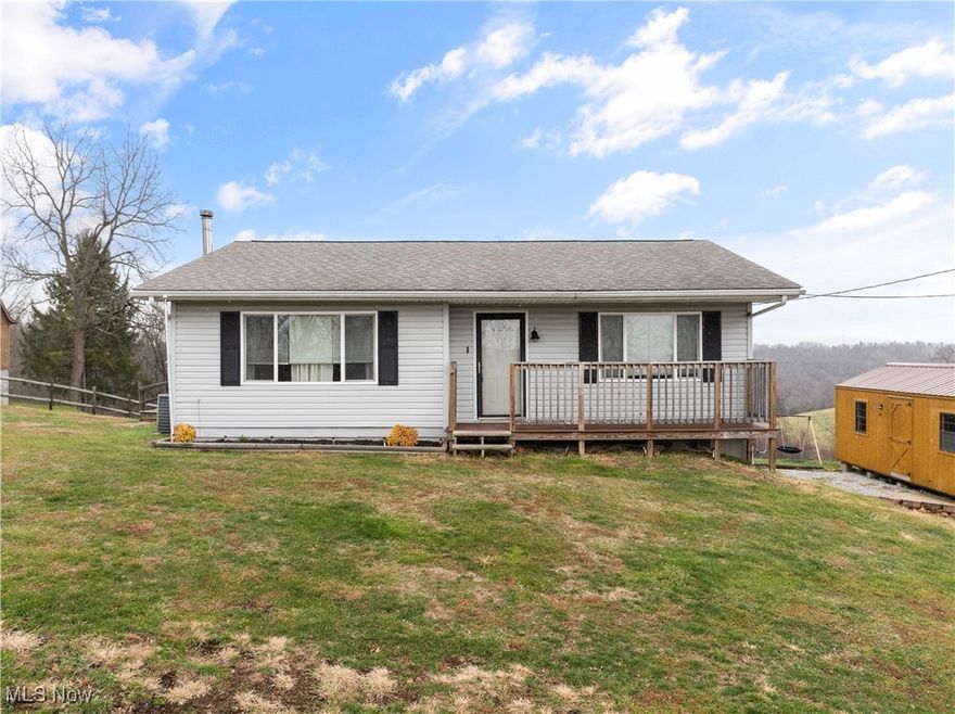 Looking for the home that is your peace and respite from the day to day?  Look no further. Whether you sit out on the front porch and enjoy the sunset and view, or the large back deck (freshly painted), enjoying the view of the hills and valleys of our wonderful area, you will enjoy the quiet and serenity of this homes location.  This home has been remodeled with easier living in mind.  This ranch home features 2 bedroooms and a full bathroom on the main living area, then go downstairs and find a large finished bedroom with access to the back yard, corrugated tin ceiling, finished bathroom and an additional finished space you can use for an office, bar, or even consider it a captured bedroom if you need a fourth bedroom. There is still plenty of room leftover in the basement that is your laundry room, separate room for the hot water tank and furnace, and another room that holds your backup heat wood burner.  Plenty of storage and closet space.  This house has everything, except you! See it before it is too late! 
Comes with 2 year home warranty! MOTIVATED SELLERS!