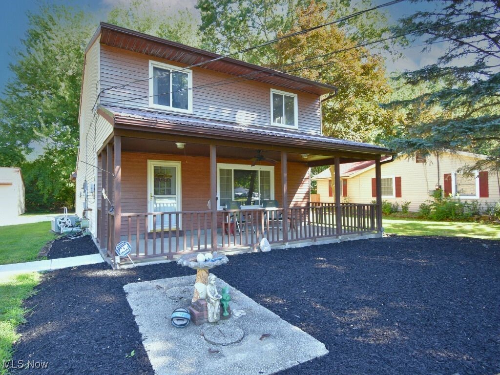Welcome to this charming 3-bedroom, 2-bath Colonial that’s been beautifully maintained and thoughtfully updated! Step inside to find brand-new carpet throughout and a spacious, comfortable layout. The home offers a bright living area, functional kitchen with all appliances included (yes—even the washer and dryer!), and the convenience of central air for year-round comfort. Recent updates provide peace of mind, including a new steel roof on both the house and garage (2024), a new concrete sidewalk (2024), and an updated covered back patio that’s perfect for relaxing or cookouts and entertaining. You will also enjoy the large front yard from the comfortable front Porch, a 2-car garage complete with an oversized work area and the included One Year Home Warranty! This move-in-ready home truly has it all—space, updates, and comfort. Don’t miss your chance to make it yours!