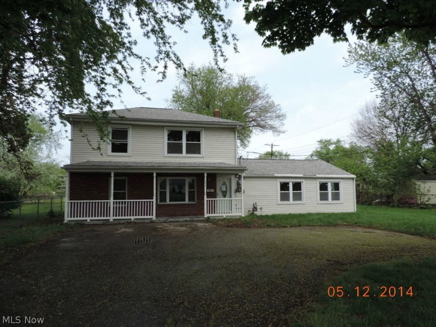 4/5 bedroom, 2.5 bath home on a large city lot! Interior features include: living room and Family room, spare room could be used as a bedroom or office, laundry on first floor, central air, tile in kitchen, Full and half bath on the main floor, some updates and more! Exterior features include; deck, front porch, mature trees on lot, house sits back off the road, paved driveway and more. This property is being sold AS-IS.