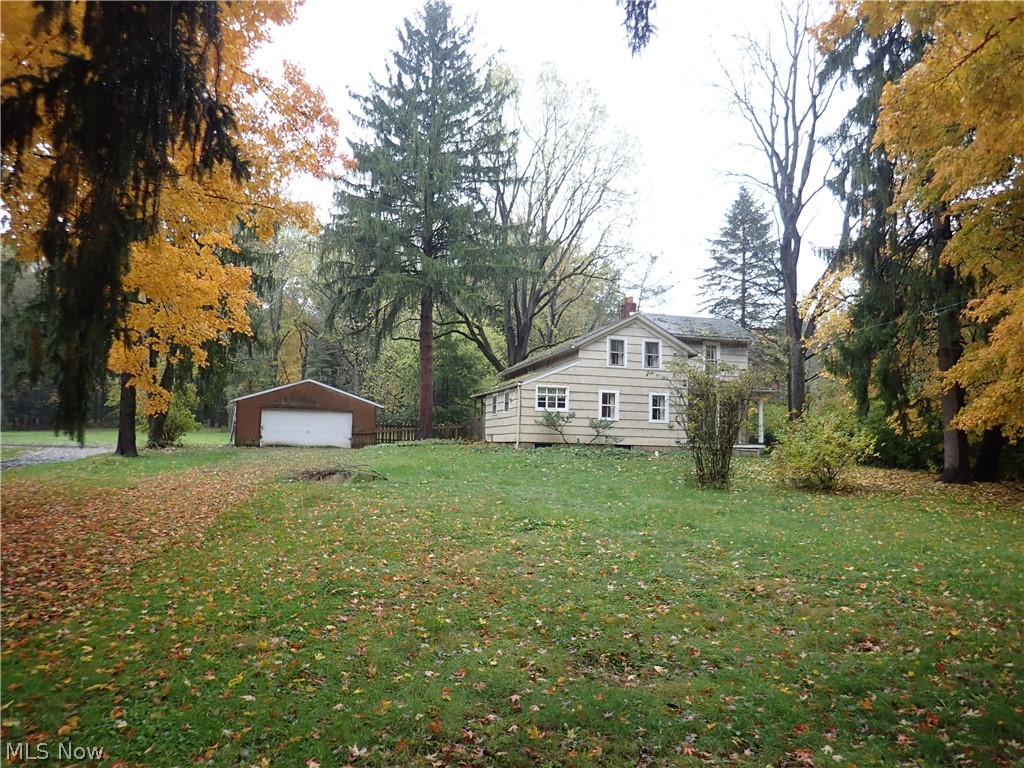 Wow! 1.53 acres in Manchester 4 bedroom 2 full bath home. Large living room with fireplace. Huge dining room. First floor bedroom and bath! First floor laundry. Three large bedrooms on the 2nd floor with another full bath. Two car detached garage.. Needs work … put your sweat equity here!