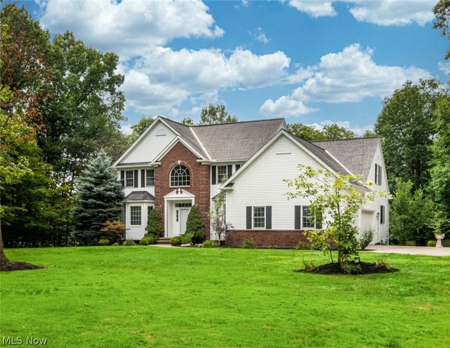 Welcome Home! This fantastic 4/5 bedroom colonial offers 9’ ceiling, bright kitchen with eat in space and center island, large 3.8 acre private parcel and oversized 3 car attached garage with stairway to the basement. The first floor also has a full laundry room with backyard access and an extra room that is great for den or study. Upstairs you will find a master suite with large walk in closet and master bath and four additional bedrooms and full bath. The lower level of this home has a large rec room with fireplace, walk out patio doors to back yard patio, full kitchen and two more finished rooms. All of this in a neighborhood setting with cul-de-sac location. GCHD Septic POS has already been completed and passed.  New Furnace and AC installed in 2020!  New Carpet throughout!