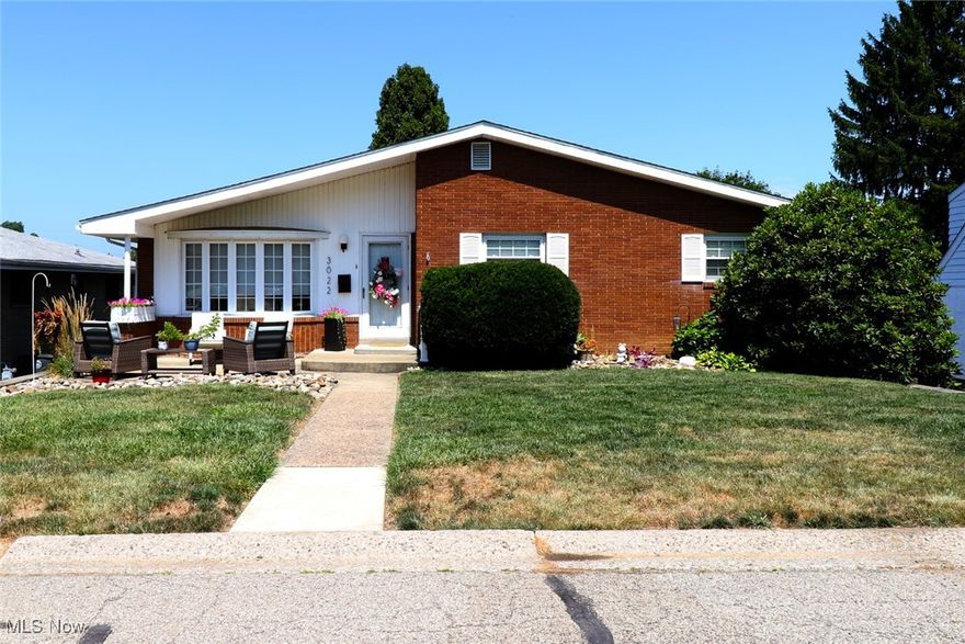 Welcome home to effortless living in this meticulously remodeled 3-bedroom, 2-full bathroom ranch, thoughtfully updated in 2021. Nestled in a convenient location, this home offers the perfect blend of modern amenities and timeless appeal, all within easy reach of essential amenities, local schools, and Franciscan University. Plus, you're just 30 min. from Pittsburgh International Airport.
Step inside to discover a bright and inviting living room & eat-in kitchen, where culinary dreams come to life. Featuring appliances including a dishwasher, refrigerator, microwave, and range, this space is further enhanced by a custom-built China cabinet and custom-made, flip-up butcher block serving bar or additional counter space. The adjacent dining area dazzles with new decorative lighting, setting the perfect ambiance for every meal.
The primary and second bedrooms boast beautifully refinished original hardwood floors, preserving the home's character, while new flooring extends throughout the entire main floor, offering a fresh, cohesive look. Prepare to be wowed by the completely remodeled main floor bathroom, a true sanctuary featuring new lighting, a contemporary shower, stylish floors, a modern sink, chic mirrors, and custom cabinetry with a clever flip-top, lighted vanity.
Descend to the newly carpeted basement via secure stairs, complete with a built-in gate for peace of mind. The finished rec room offers ample space for relaxation and entertainment, featuring plush new carpet and new vinyl tile in the dry bar area. The ingenious L-shape design adds a versatile 11x9 extra area, perfect for a gaming room, a child's play haven, a dedicated home office, or anything your lifestyle desires.
Recent upgrades include a new water filter system installed in 2025, ensuring clean, fresh water. This move-in-ready gem is waiting to be your next dream home. Don't miss the opportunity to experience comfort, style, and convenience in one desirable package!