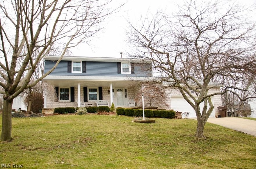 Fabulous two story home located in North Canton! The inside of this home is just lovely and has so much to offer.  Spacious kitchen includes appliances, most of which are less than five years old.  Dinette area is wonderful with a door leading out to the fantastic deck overlooking the backyard.  Home includes a formal dining room as well as a 12x19 living room.  First floor laundry is so convenient and includes new flooring! The upstairs has four bedrooms which includes a nice owner's suite with two double closets and owner's bath.  The full bath on the second level also had brand new flooring! The lower level is another living area in itself! Huge rec room area is great for entertaining or company and offers another full bath with shower! Wow! See this beautiful home today!