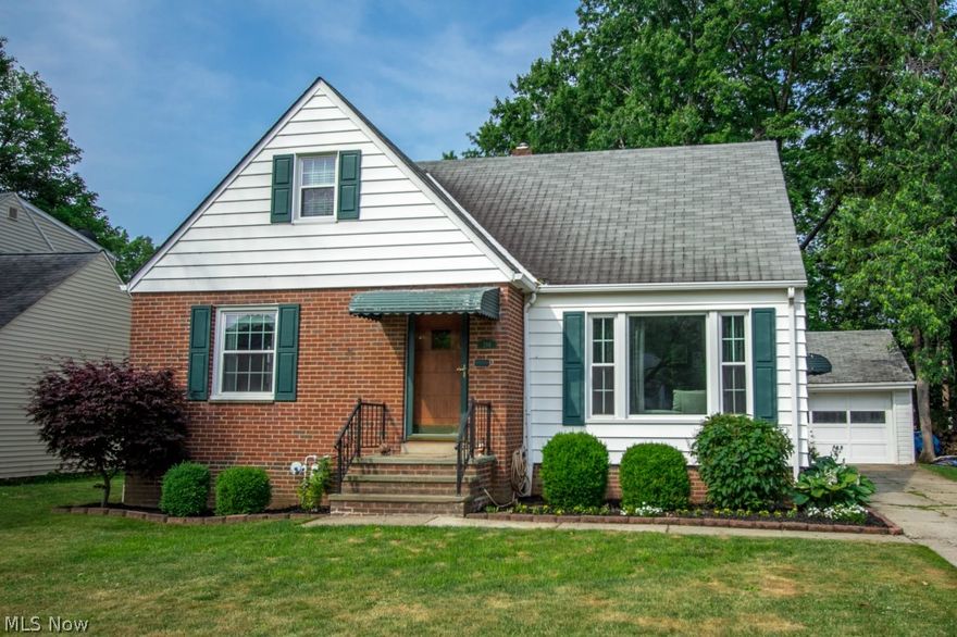 Plenty of character abounds in this cozy 3 BR,1-1/2 Bath bungalow with arched entryways, cove ceiling and wider floor moulding throughout. Living Room with hardwood flooring has cove ceiling w/crown moulding, a large picture window and is a great place for family gatherings. Updated eat-in kitchen w/ceramic tile flooring, pantry and all stainless steel appliances. Nice size Master Bedroom has his and her closets. Second bedroom on main. Entire upstairs dormer features third bedroom with possible sitting area, office, walk-in closet or 4th bedroom, attic access storage, built-ins, cedar closet & convenient half bath. Very clean, unfinished full basement with pool table can be huge recreation room, office, play room, etc. and is plumbed for bath. Large park-like backyard. 2 car detached garage with electric and pull down attic storage. All newer windows (2010), HVAC (2008), HWT (2010), newly updated electric, main bath updated (2010), most hardwood updated (2012). BRAND NEW ROOF on house