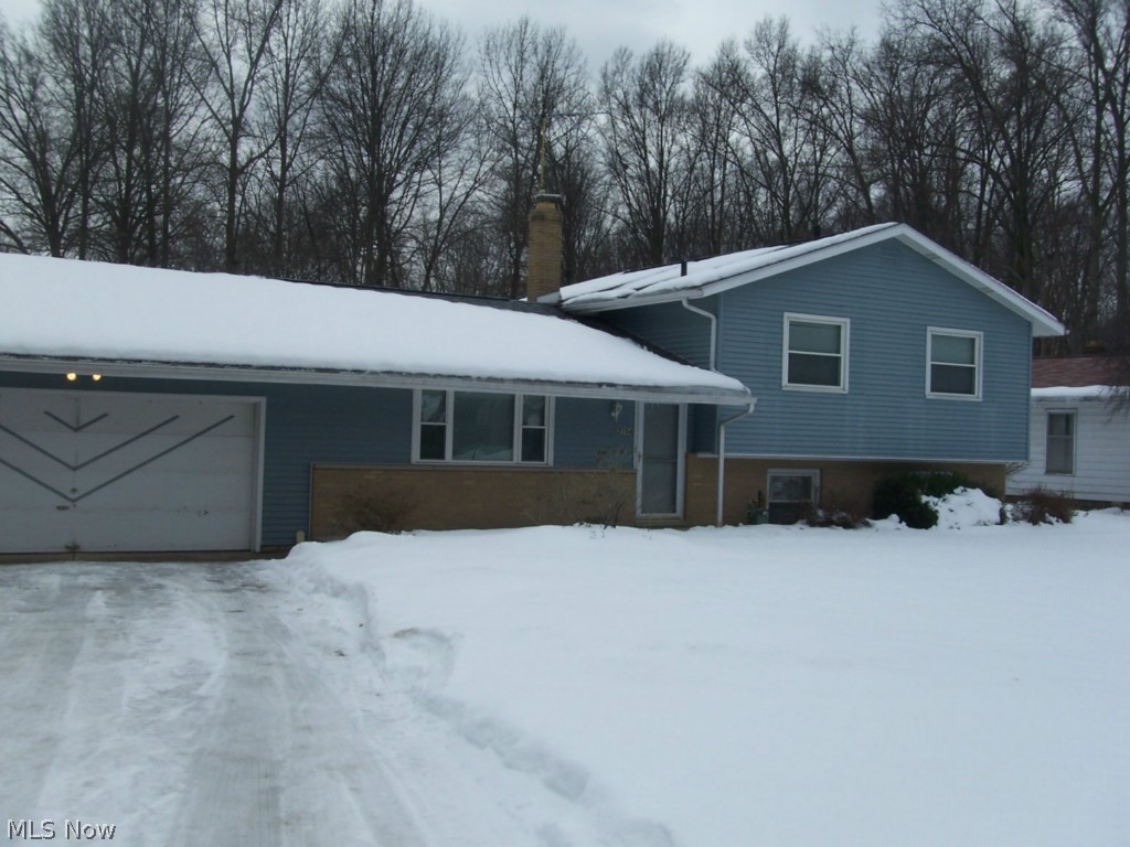 An exceptional 4 bedroom, 2 full bath 4 level split in Stow. The updated gourmet kitchen has quartz counter tops, top of the line cabinets, and comes with all of the appliances. About half of the back yard is fenced of this .813 acre lot. This home has many updates and is move in ready. The large family room walks out, and has a beautiful fireplace. There is a large living room, eating area, complete lower level for storage, 2 car garage, hard wood floors, and much more.