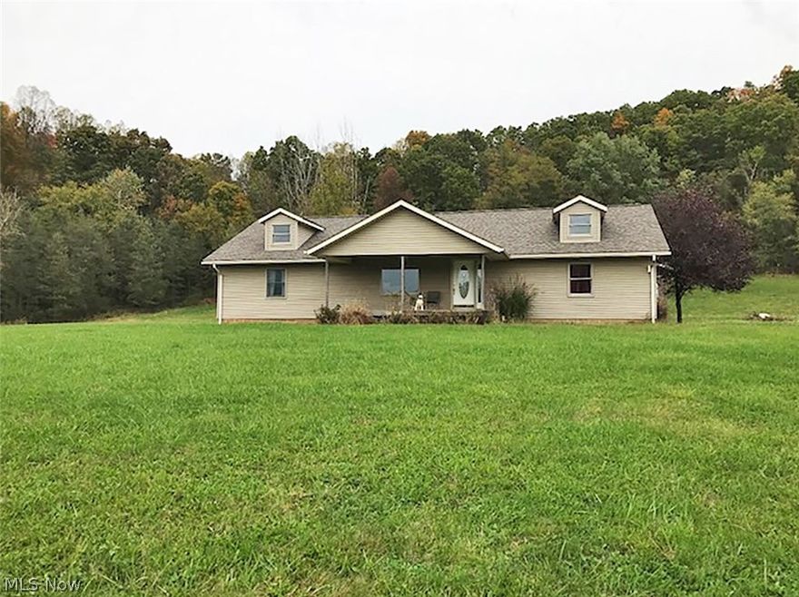 Spacious 3 bedroom 2 bath ranch home on 13.6+ acres.  Large living room and master suite with a tub and separate shower.  Extra large 3 stall attached garage with access to full basement.  Nice large yard area with horse barn and fenced in area for the horses. Property will have an easement to use the existing paved drive.  Property will need its own water well drilled.  Property to be surveyed and expected regional planning approval for new lot lines.